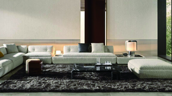 Sectional fabric sofa with the seat cushions and marble or wood tops