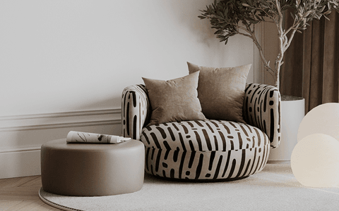 modern accent chair and ottoman for a cozy foyer