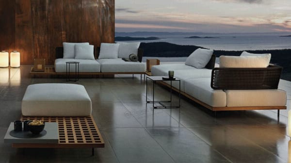 Contemporary modular outdoor sofa set with slatted wood details and a Outdoor Square Side Table