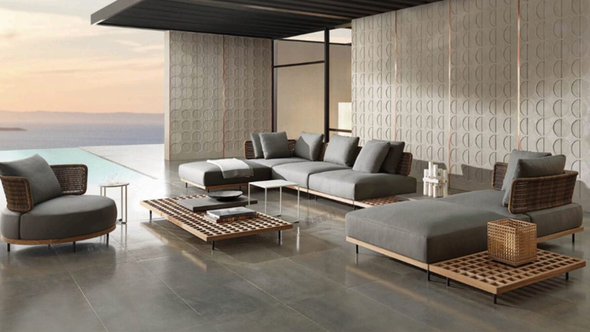 A luxurious outdoor modular sofa set with a round chair and coffee tables