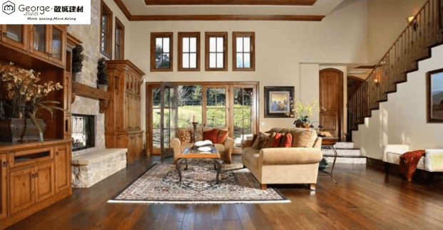 A spacious living room featuring elegant timber flooring and classic wooden furniture