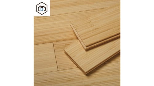 A close-up of light-colored natural bamboo flooring with visible grain patterns.